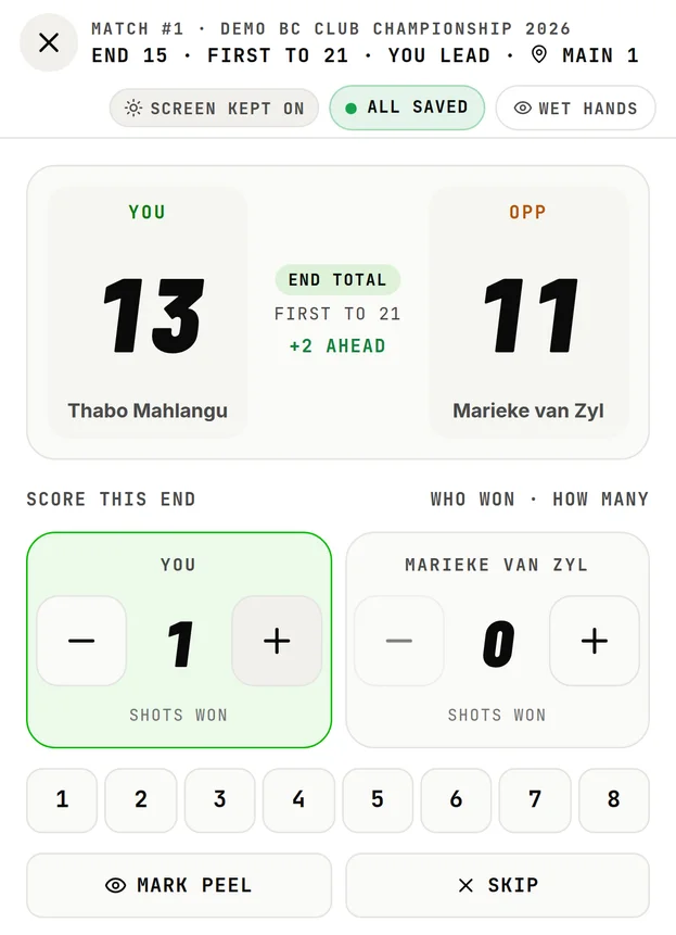 The same match on a phone at the green: Thabo Mahlangu 13, Marieke van Zyl 11, end 15 being scored.
